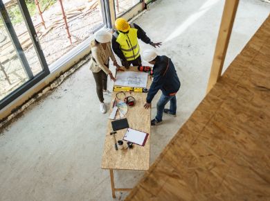 image of three construction workers on a job site